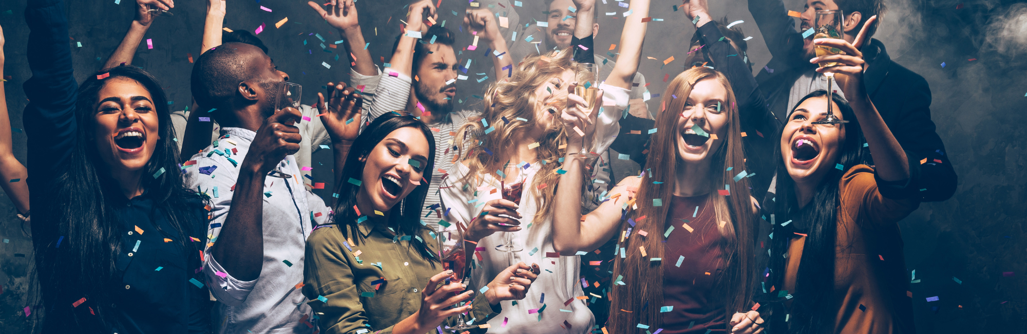 people at a New Year's Eve party celebrating 